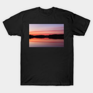 Serene view of calm lake and tree silhouettes T-Shirt